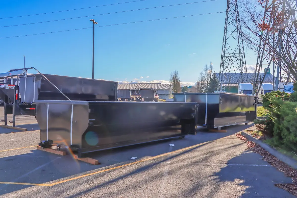 Roll-off dumpster ready for waste disposal at job site for 2 Yard Dumpster Rental in Idabel